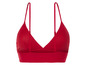 Un soutien-gorge de sport rouge avec une large bande.