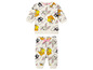 Un sweat-shirt et un pantalon de jogging blancs avec un motif Bugs Bunny, Daffy Duck et Sylvester.