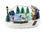 Décoration de Noël avec patinoire, arbres lumineux et figurines
