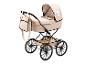 Poussette de poupée beige avec cadre et roues noires, avec sac assorti.