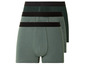 Trois boxers verts, dont un avec un motif topographique.