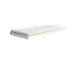 Matelas Emma sur un sommier, style minimaliste.