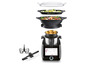 Un Thermomix, robot de cuisine multifonction avec divers accessoires et contenants.