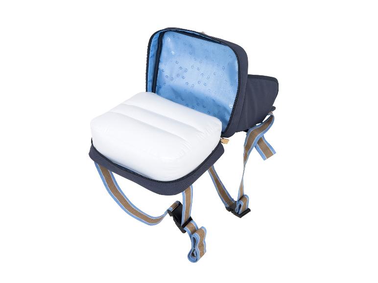 Sac bleu ouvert avec un oreiller gonflable blanc à l'intérieur.