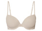 Un soutien-gorge beige avec des bonnets lisses et des bretelles réglables.