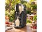 Machine à slushie premium SILVERCREST SSM 220 A1 sur une table de jardin avec de la glace.