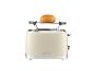 Toaster rétro 1973 avec un petit pain dessus.