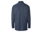 Une chemise bleu marine à pois blancs.