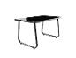 Table à manger avec plateau en verre noir et pieds métalliques en forme de U