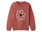 Pull rose en tricot pour enfant avec fleur à paillettes.