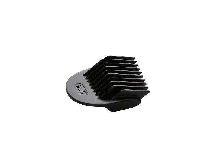 Accessoire de tondeuse à cheveux noir avec peigne.