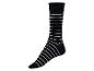 Une chaussette noire avec des rayures blanches.
