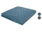 Couverture matelassée bleu sarcelle, motifs géométriques.