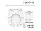 Une lunette de toilette blanche avec fermeture douce de Schütte, avec des instructions de montage et du matériel de fixation.