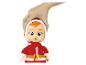 Une poupée bébé de Noël vêtue d'un costume rouge de Père Noël.