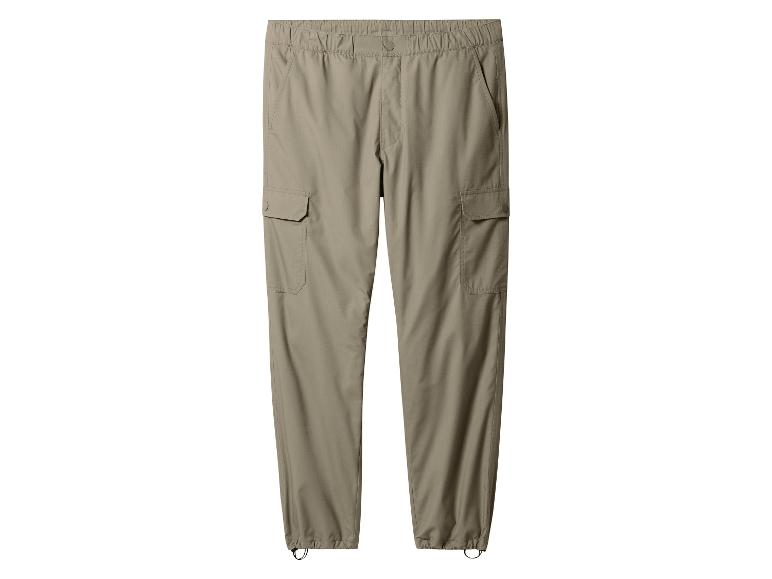 Pantalon cargo beige avec taille élastique et poignets ajustables.