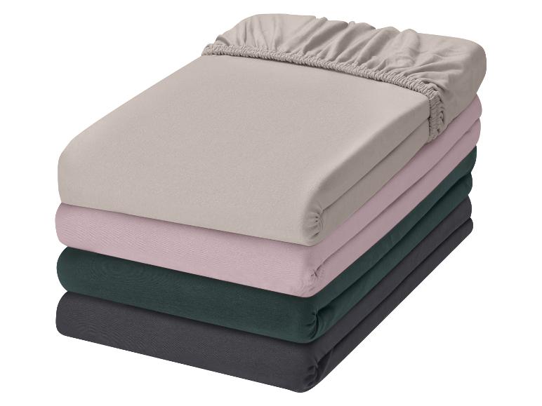 Draps-housses en jersey LIVARNO home en quatre coloris différents.