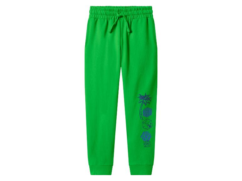 Pantalon de jogging vert avec cordon de serrage et imprimé bleu inspiré de Minecraft sur la jambe.
