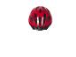 Un casque de vélo rouge avec des réflecteurs blancs.