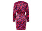 Une robe noire à manches longues avec un imprimé floral rose et violet.
