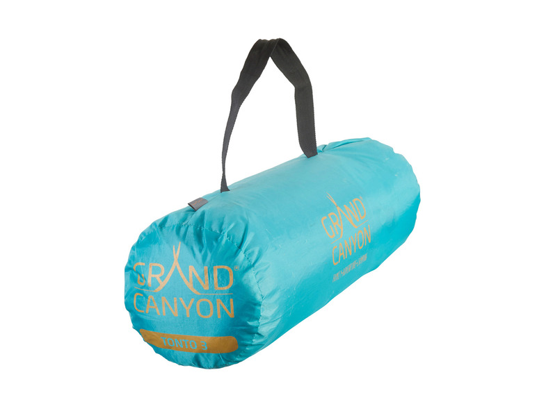 Une tente Grand Canyon Tonto 3 bleue, pliée dans un sac de transport.