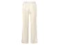 Pantalon de survêtement blanc avec taille élastique.