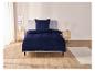 Une housse de couette bleu foncé avec un motif floral sur un lit.