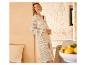 Ensemble top et jupe en crochet beige clair, style estival.