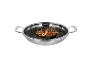 Wok en acier inoxydable avec filet de bœuf et légumes sautés.