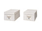 Deux boîtes de rangement beiges avec un motif de feuilles blanches.