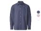 Chemise bleue à manches longues avec boutons blancs et logo brodé