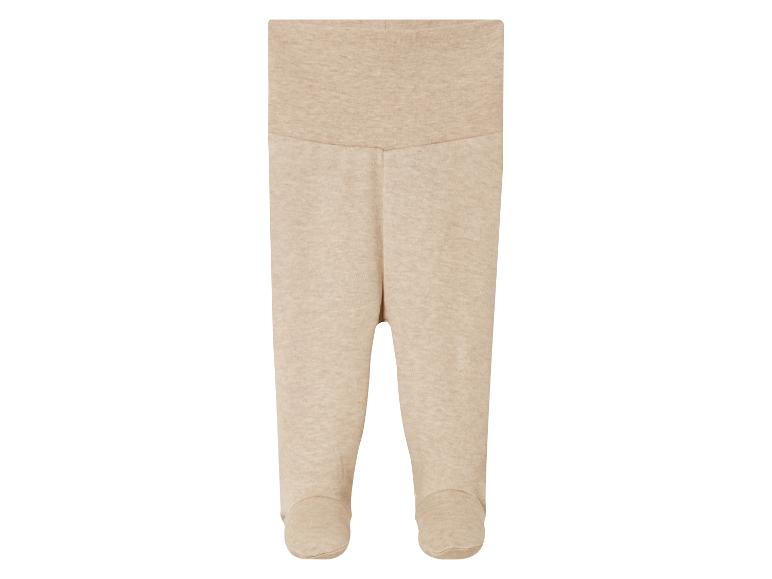 Leggings bébé beige avec pieds.