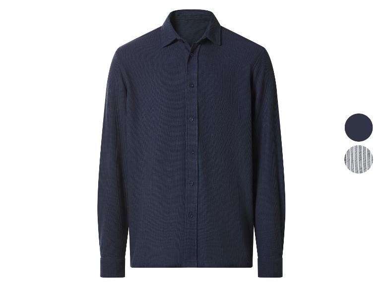 Chemise homme bleu marine à manches longues avec deux échantillons de couleur.