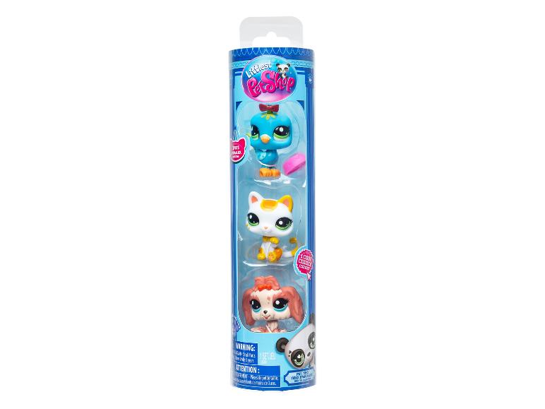 Ensemble Littlest Pet Shop avec trois figurines d'animaux : un oiseau, un chat et un chiot.