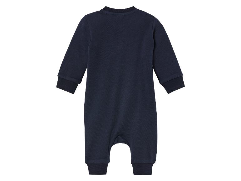 Une grenouillère bleu marine pour bébé avec des manches longues.