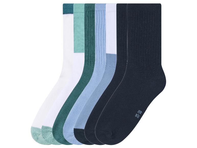 Six paires de chaussettes en blanc, nuances de vert et de bleu, et bleu foncé, taille 35-38.