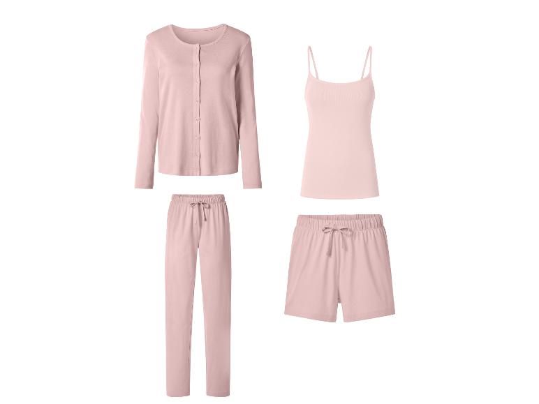 Ensemble de pyjama rose pâle comprenant un cardigan, un débardeur, un pantalon et un short.