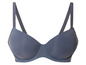 Un soutien-gorge gris foncé avec des bonnets lisses et des bretelles larges.