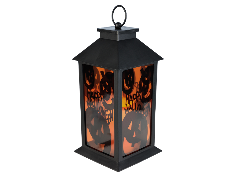 Lanterne noire d'Halloween avec lueur orange, découpes de citrouilles et texte 'Happy Halloween'.