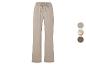 Pantalon ample beige avec cordon de serrage.