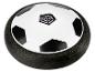Ballon de football flottant noir et blanc avec une toile d'araignée au centre