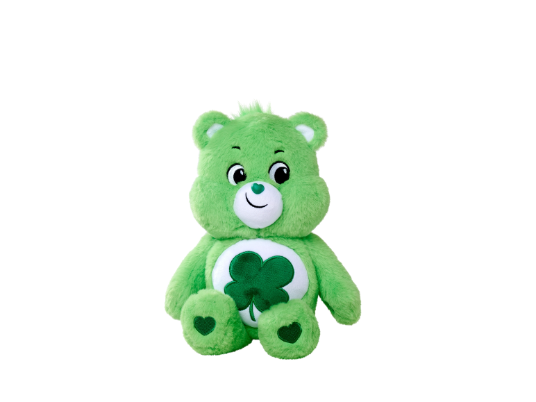Ours en peluche vert avec un trèfle sur le ventre