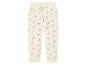 Pantalon de jogging blanc à imprimé arc-en-ciel.
