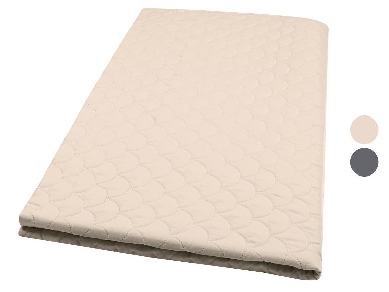 Protège-matelas matelassé beige avec motif écailles