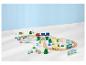 Circuit de train en bois Peppa Pig avec train, bus et figurines.