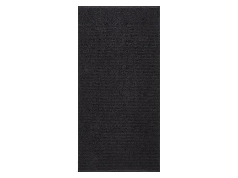 Tapis de bain noir à rayures horizontales