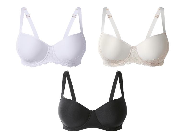 Trois soutiens-gorge en blanc, beige et noir, avec bretelles réglables et détails en dentelle.