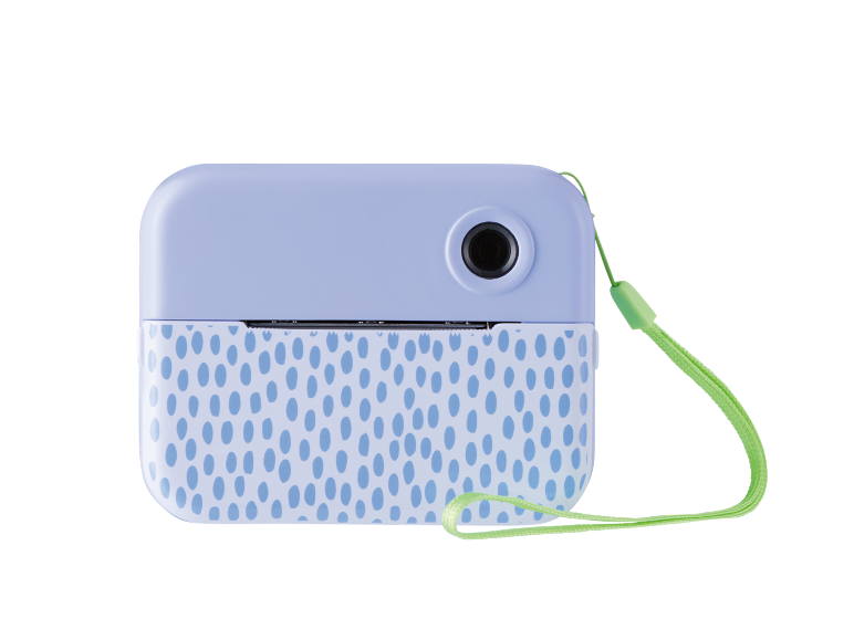 Appareil photo instantané bleu clair avec motif à pois et dragonne verte.