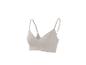 Soutien-gorge côtelé beige clair avec bretelles réglables.