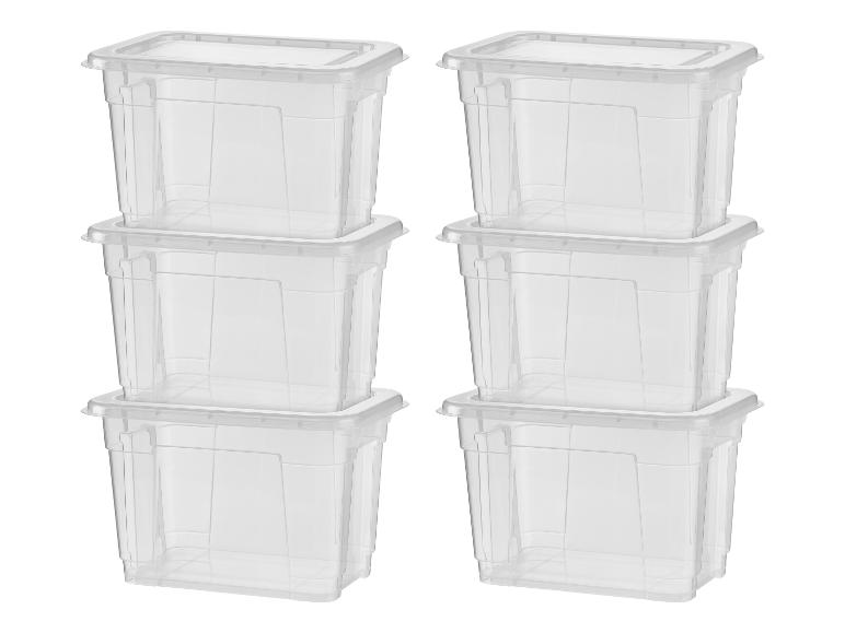 Six boîtes de rangement en plastique transparent avec couvercles, empilées en deux colonnes.